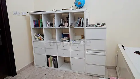 IKEA KALLAX-style white shelving unit with drawers — good condition