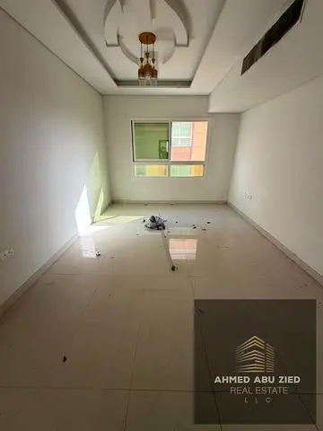 Three rooms and a hall in Al Muwaihat 3, Academy Street, close to schools and Mohammed Bin Zayed Road. Built-in wardrobes, 3 bathrooms.