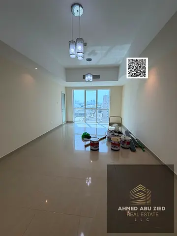 2BR hall for annual rent in Mushairif, with a balcony and sea view over Ajman Creek. Super‑deluxe finishing, prime location near Etisalat, City Centre