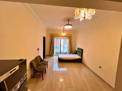 The most beautiful and largest studios for annual rent in Al Jurf 2 - Ajman A new studio with a spacious area and high-end finishes, with a balcony an