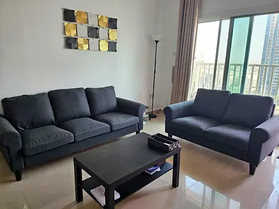 Modern 3+2 seater dark grey sofa set with matching black coffee table, all in good used condi
