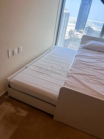 IKEA White wooden single bed with trundle – 2 mattresses included