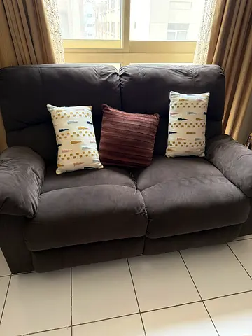 Comfortable 2-seater recliner brown fabric sofa in good condition