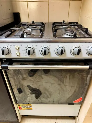 Used Midea 4-Burner Gas Stove with Oven - Working Condition