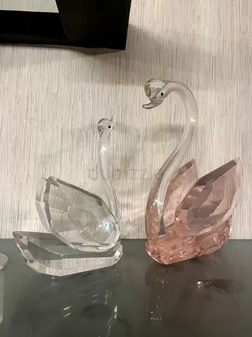 Pair of crystal swan figurines (pink and clear)
