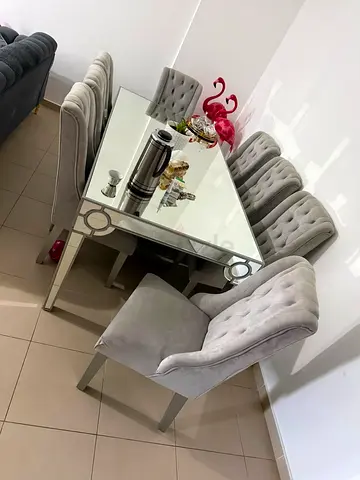 Good condition 8 chairs dining table for sale due to move out