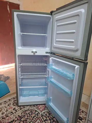 Compact double-door fridge with top freezer - good working condition