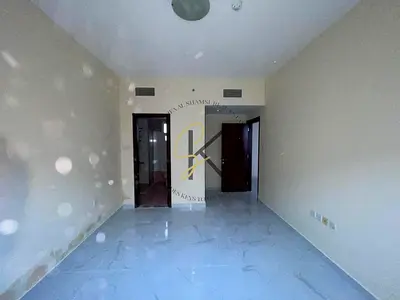 🏢✨ Spacious Unfurnished 1BHK Apartment with Balcony & Dedicated Parking for Rent in Muwailah Comm