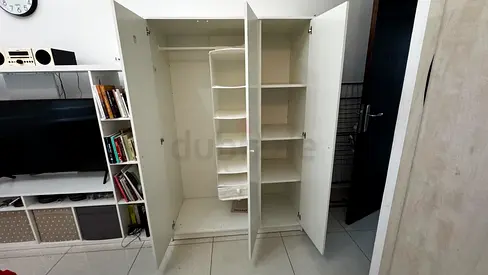 White 3-Door Wardrobe with Shelves and Hanging Rail - Good Condition