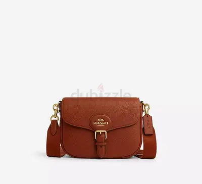 Coach Lux Pebble Amelia Saddle Bag in the color IM/Brown