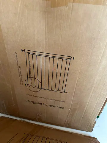 Brand new baby safety gate used once in box I have 2 set