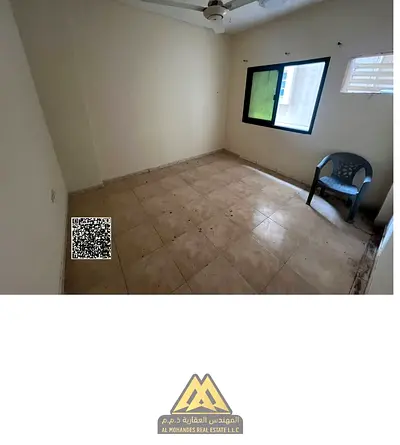 1-bedroom apartment with a hall in Al Rashidiya 1, opposite the Fish Market, balcony, AED 23,000 yearly, payable in 4 or 6 installments, no AC.