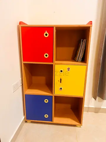 Childrens colorful 6-cubby storage shelf with doors