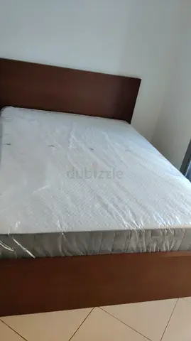 Queen wooden bed frame with mattress and drawers