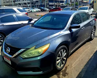 Nissan Altima 2016 100K KM well-maintained.