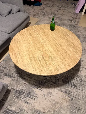Round travertine coffee table - natural stone top