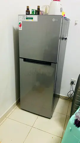 Used two-door stainless steel refrigerator - good condition
