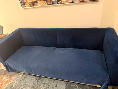 Two Blue three-seater sofa in good used condition
