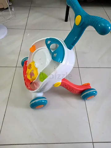 Baby push walker with activity panel - good condition