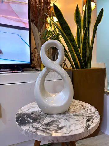 White ceramic loop sculpture decorative vase - modern accent