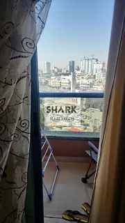 Studio for Sale in Nuaimiya Tower C | 594 Sq. Ft. | City View | Rented | AED 245,000