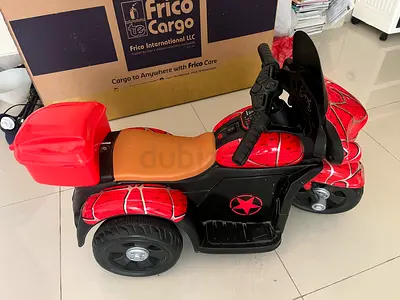 Kids 3-Wheel Electric Ride-On Motorcycle with Storage Box - Red/Black. All working. Negotiable