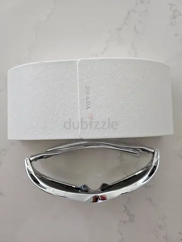 Prada designer sunglasses with white case - like new