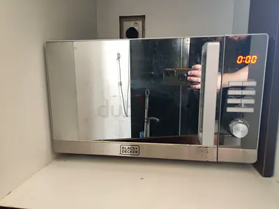 Black Decker stainless steel microwave oven - good working condition