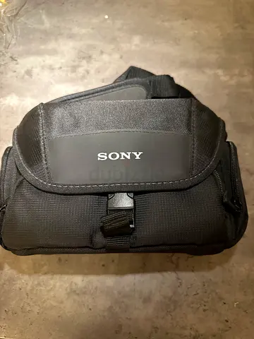 Sony black compact camera bag with shoulder strap
