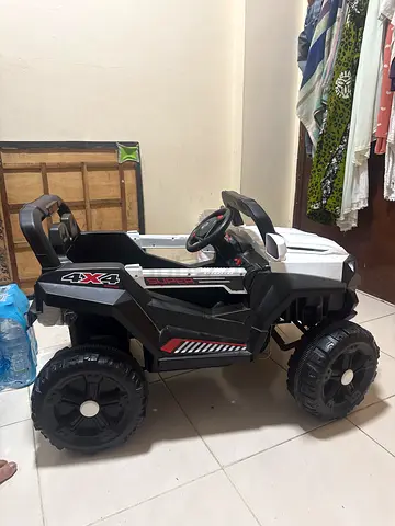 Electric Ride-On 4x4 Toy Car for Kids — Good Condition