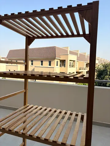 Washing machine shelving unit