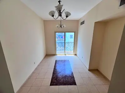 Spacious 1BHK Separate Living Room Central AC Free Maintenance Al Jurf 2 Easy Access to Dubai and Sharjah