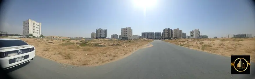 Three adjacent plots of land for sale in Global City - Al-Aliya