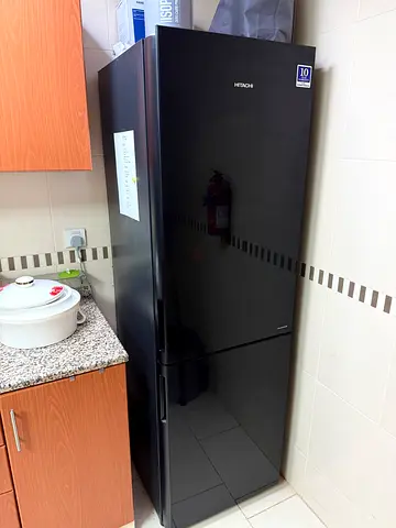 Black Hitachi Double Door Refrigerator Good Condition.