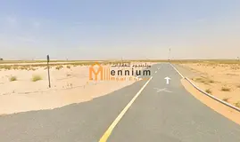 Residential land for sale in Rawdat Al Qart.