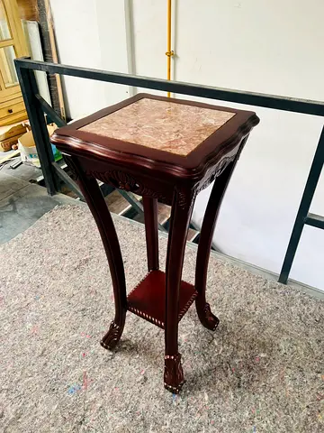 Elegant Wooden Pedestal Table with Marble Top
