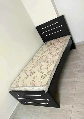 Single wooden bed with mattress - good condition