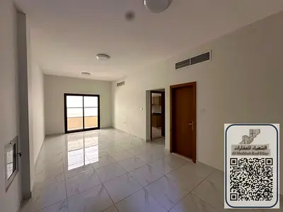 One bedroom and living room in Al Nuaimiya 1 area, spacious, 2 bathrooms, built-in wardrobes, central air conditioning, close to all services, opposit