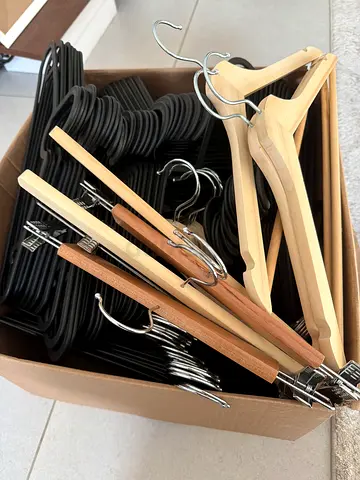 Mixed pack of wooden and plastic clothes hangers - approx 50 pieces