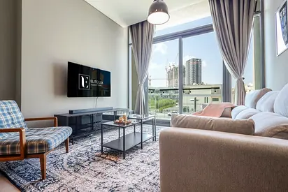 Luxurious 1BR Suite in Signature Livings, JVC - Dubai