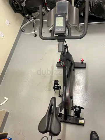 Used indoor stationary exercise bike with dual saddle - good condition