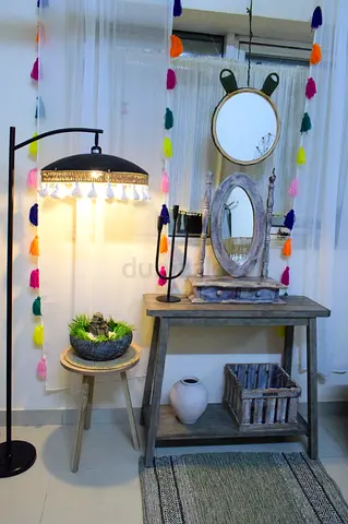 Black metal floor lamp with unique shade