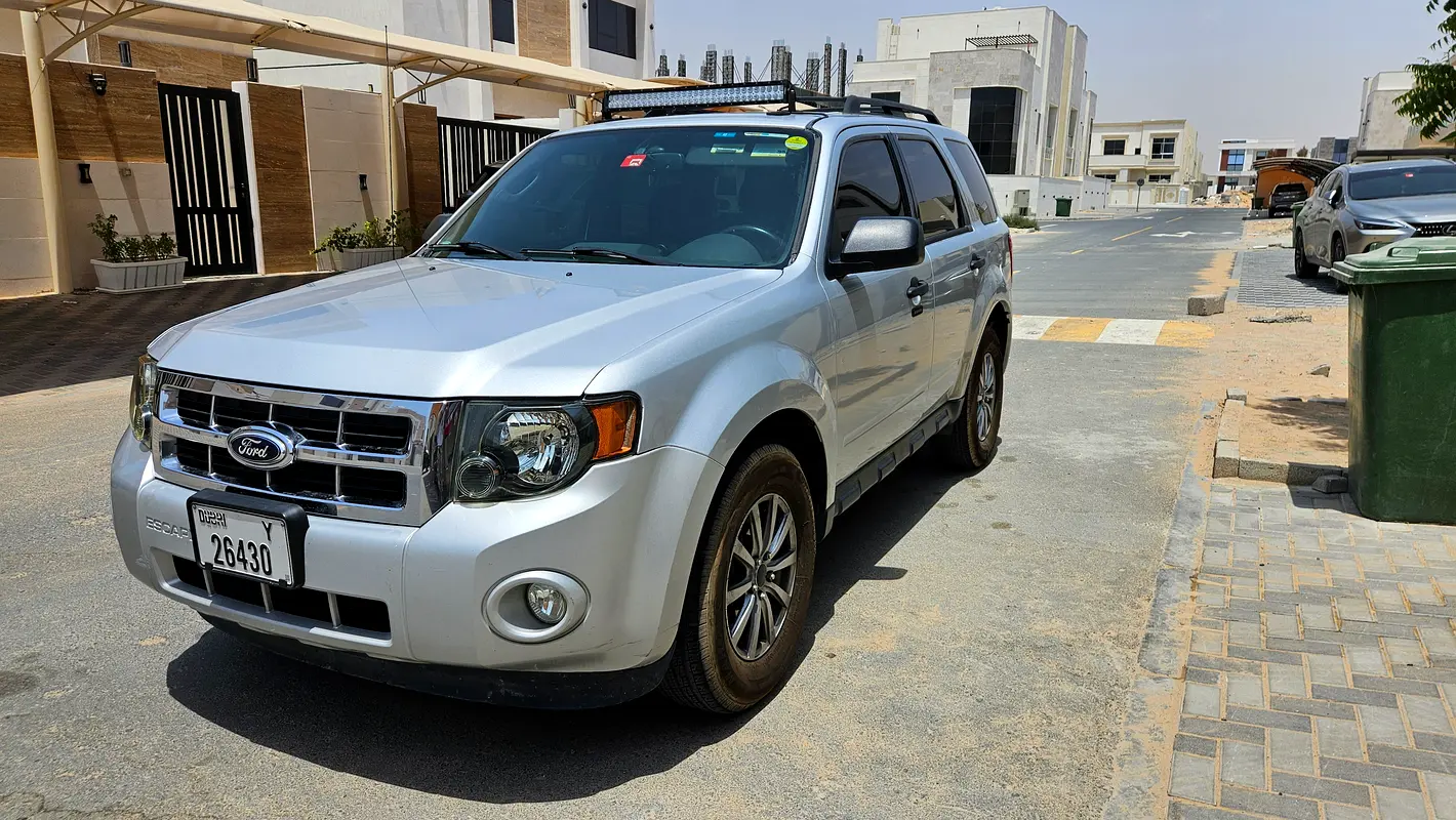 Ford Escape 2012 — photo 1 of 13