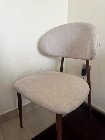 4 Pieces of Beige dining chair with wooden legs