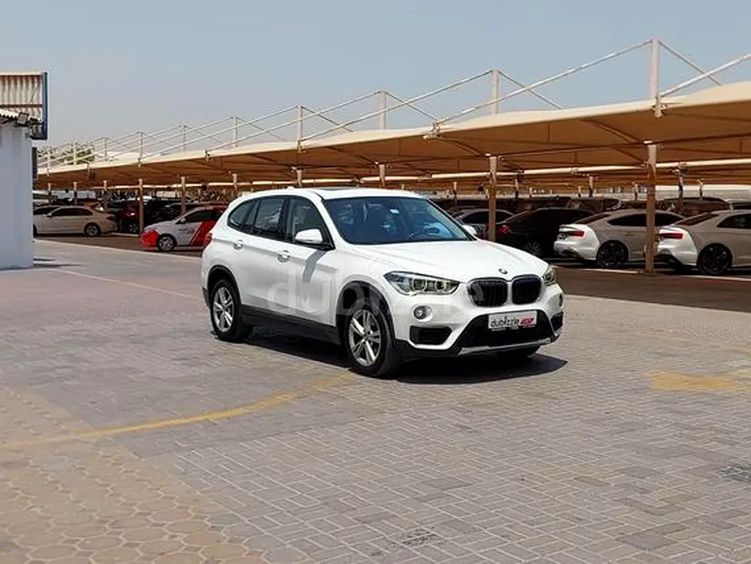 BMW X1 2019 — photo 1 of 15