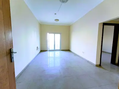 Very affordable 1BHK WITH balcony , wardrobe in G+7 building, spacious hall, central AC close to ro