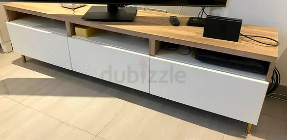 Low-profile modern TV console with three drawers — oak top, white fronts