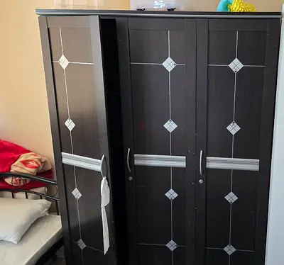 Spacious Dark Wood 3-Door Wardrobe with Diamond Design