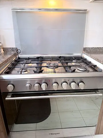 Stainless Steel 5-Burner Gas Cooker with Built-in Oven (Good Condition)
