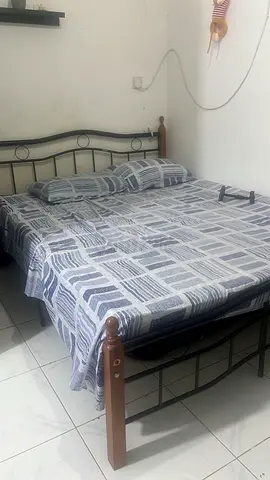 Metal frame double bed with mattress and bedding - good condition